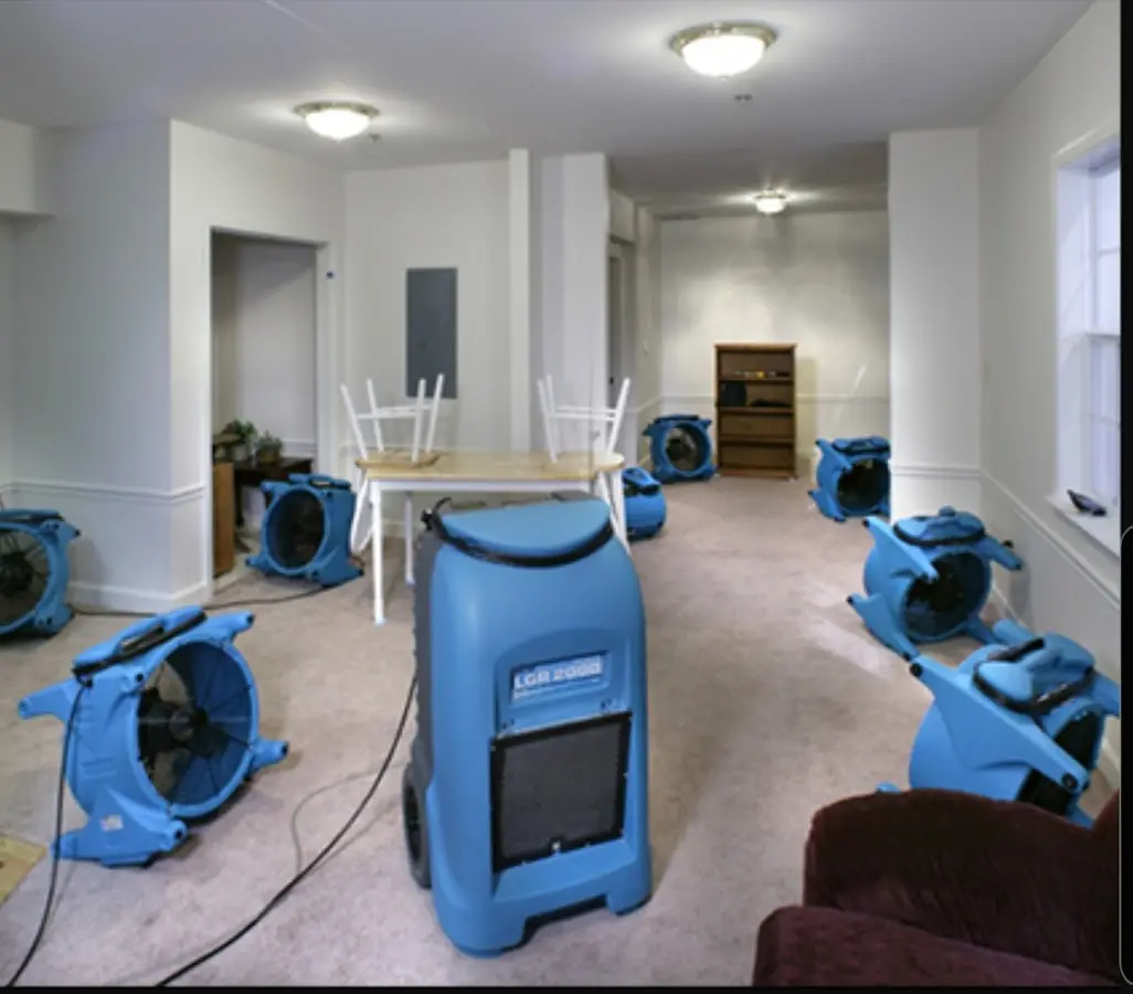 Air movers and dehumidifier setup for Water Damage Restoration in Eastchester